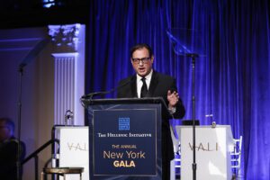 Peter J. Poulos, Executive Director, The Hellenic Initiative, offers remarks.